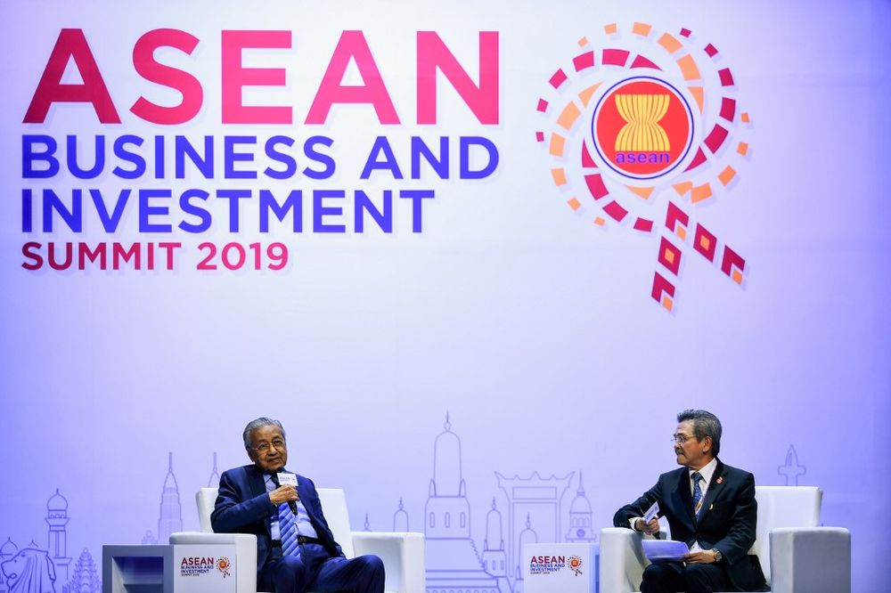 Prime Minister Tun Dr Mahathir Mohamad (left) speaks next to Chairman of the Asean Business Advisory Council (Asean-BAC) Arin Jira during a business forum on the sidelines of the 35th Asean summit in Bangkok on November 2, 2019. u00e2u20acu201d AFP pic