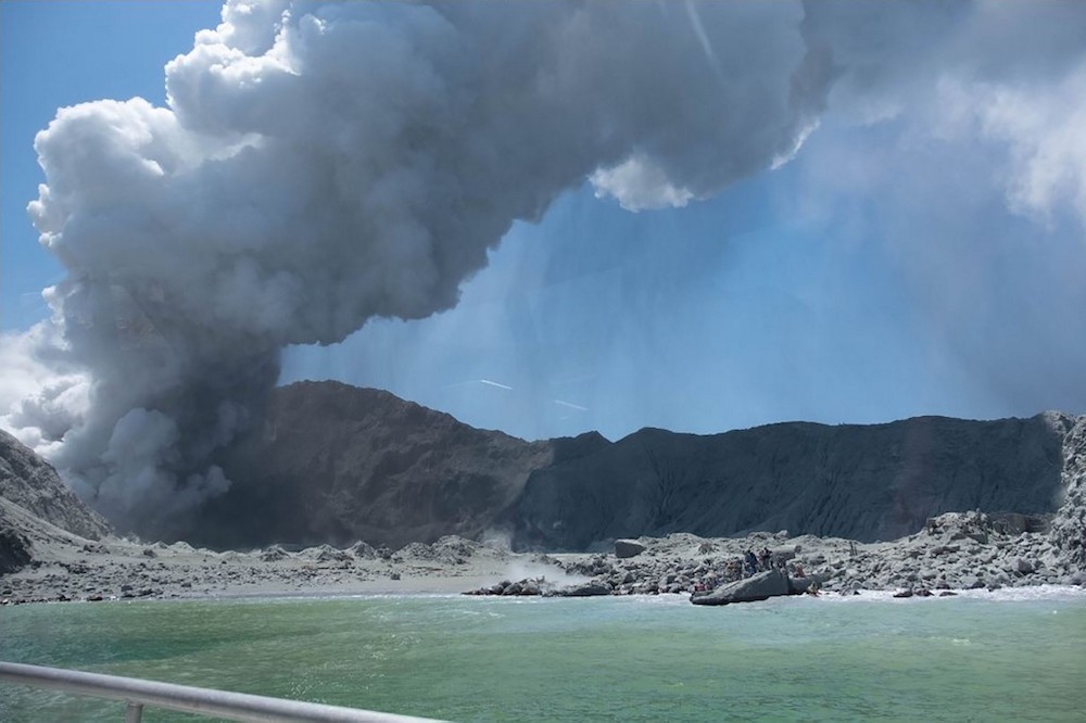 This handout photograph courtesy of Michael Schade shows the volcano on New Zealandu00e2u20acu2122s White Island spewing steam and ash minutes following an eruption on December 9, 2019. u00e2u20acu201d AFP pic