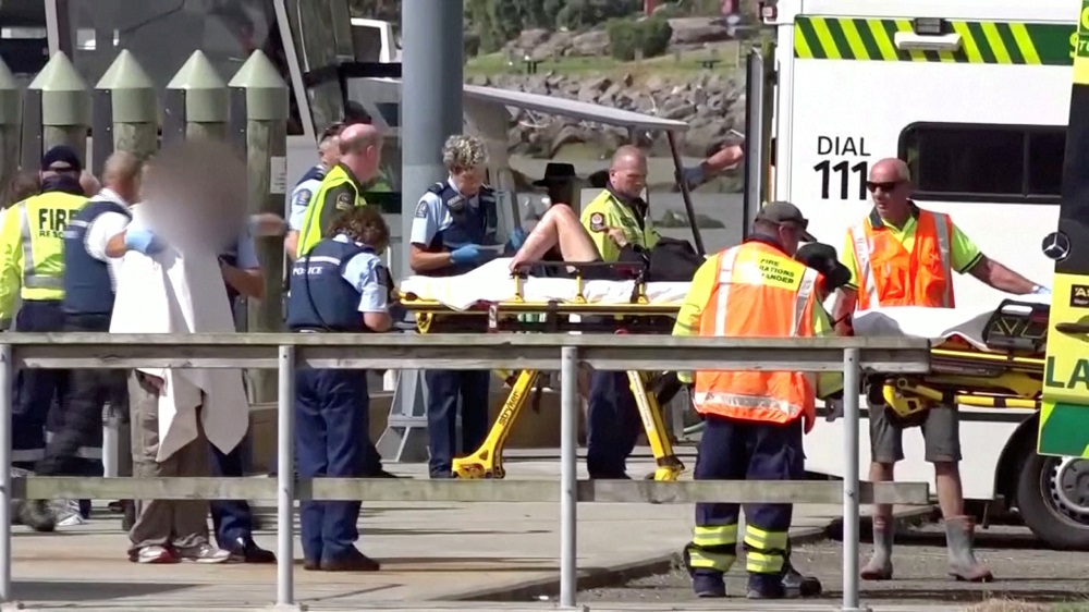 A person injured by the White Island volcano eruption is wheeled into a waiting ambulance on a stretcher in Whakatane, New Zealand December 9, 2019, in this still image taken from video. u00e2u20acu201d Picture by TVNZ via Reuters