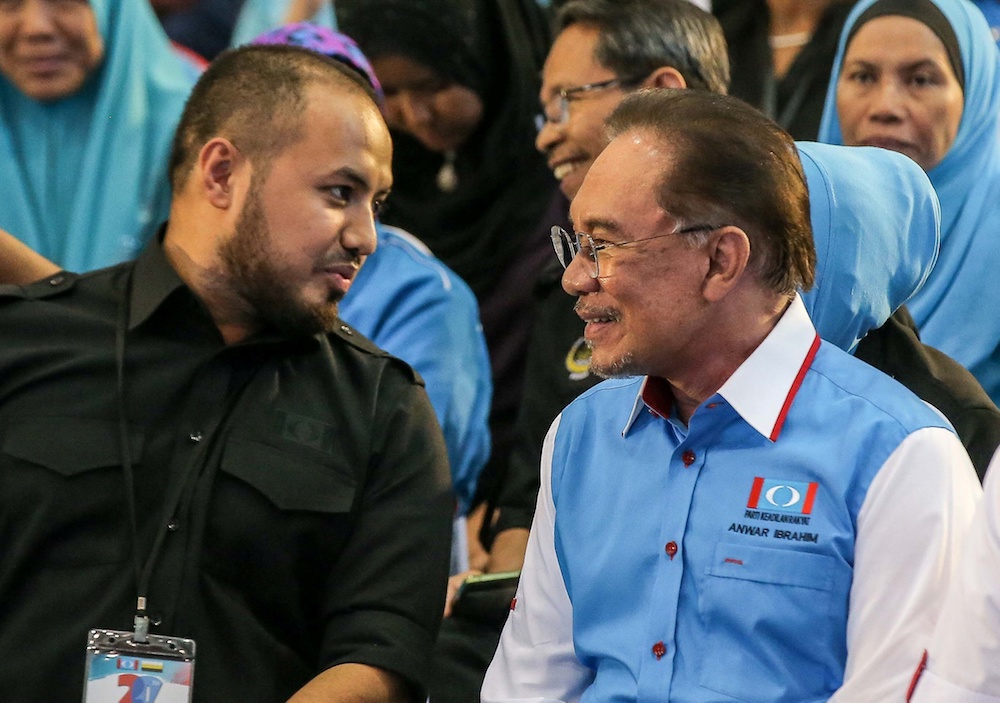 Perak PKR chief Farhash Wafa Salvador Rizal Mubarak and PKR president Datuk Seri Anwar Ibrahim attend the Perak PKR Convention in Kuala Kangsar December 3, 2019. u00e2u20acu201d Picture by Farhan Najib