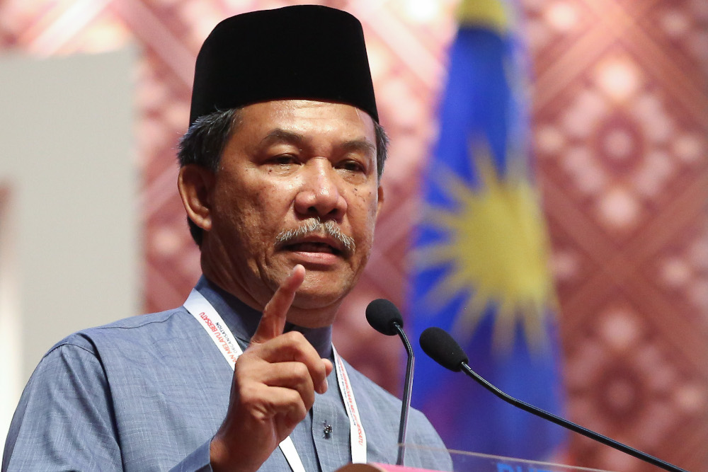 Umno deputy president Datuk Seri Mohamad Hasan speaks at the opening of the Woman, Youth and Puteri wings during the 2019 Umno General Assembly at the PWTC in Kuala Lumpur December 4, 2019. u00e2u20acu201d Picture by Yusof Mat Isa