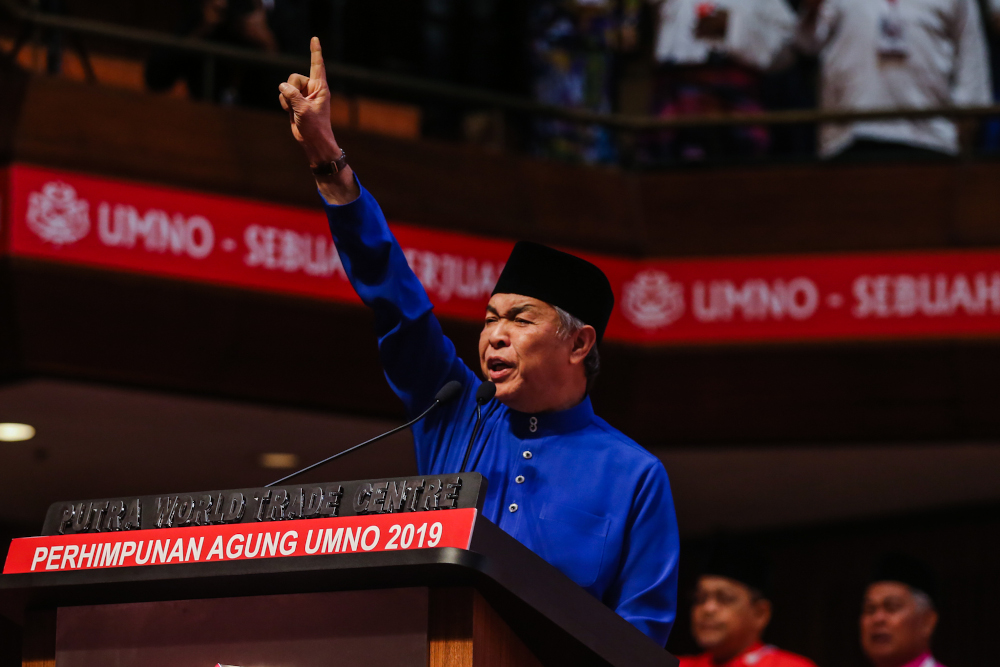 Umno president Datuk Seri Ahmad Zahid Hamidi delivers his speech during the Umno General Assembly 2019 at PWTC in Kuala Lumpur December 7, 2019 u00e2u20acu201d Picture by Firdaus Latif