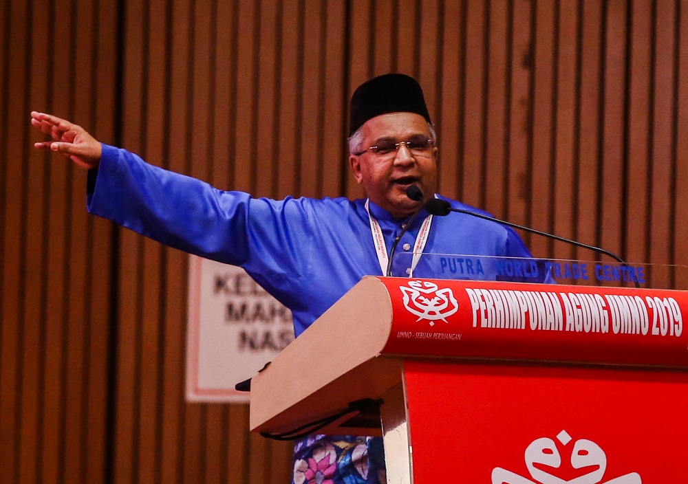 Bukit Gelugor division chief Datuk Omar Faudzar speaks during the Umno Annual General Assembly in Kuala Lumpur December 7, 2019. u00e2u20acu201d Picture by Firdaus Latif