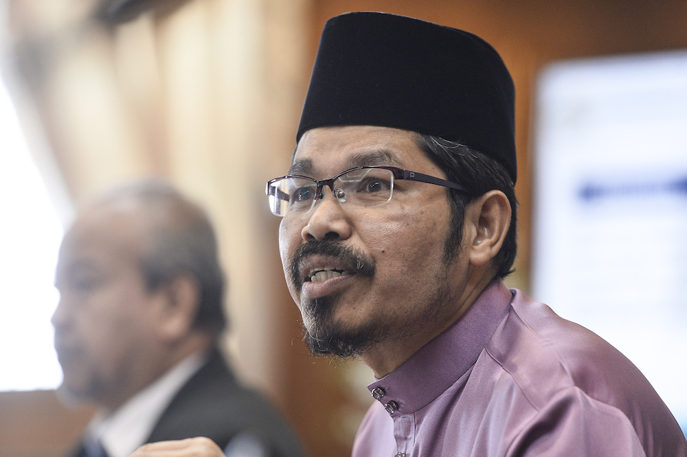 Statistics Department chief Datuk Seri Mohd Uzir Mahidin speaks during the launch of the 2018 Graduates Statistics in Putrajaya December 13,2019. u00e2u20acu201d Picture by Miera Zulyana