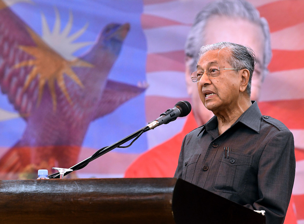 Prime Minister Tun Dr Mahathir Mohamad addresses a gathering with Pakatan Harapan reps and village community heads in Kuah, Langkawi December 8, 2019. u00e2u20acu201d Bernama pic