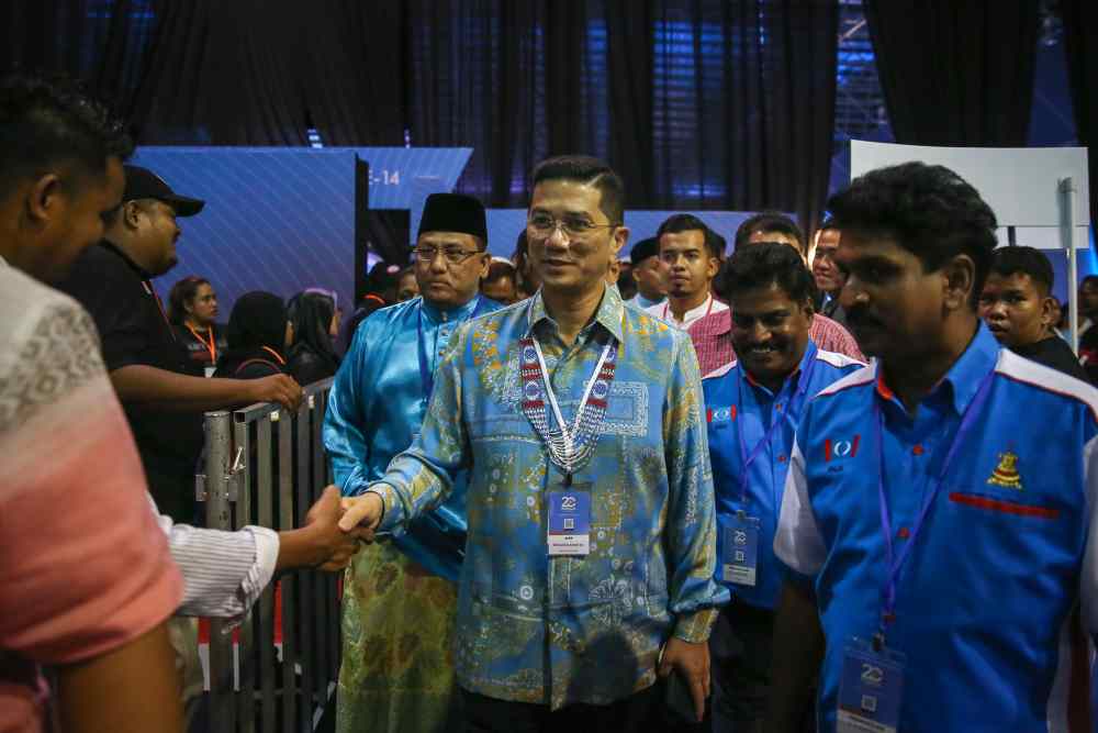 PKR deputy president Datuk Seri Mohamed Azmin Ali greets party members during the 2019 PKR National Congress in Melaka December 7, 2019. u00e2u20acu2022 Picture by Yusof Mat Isa