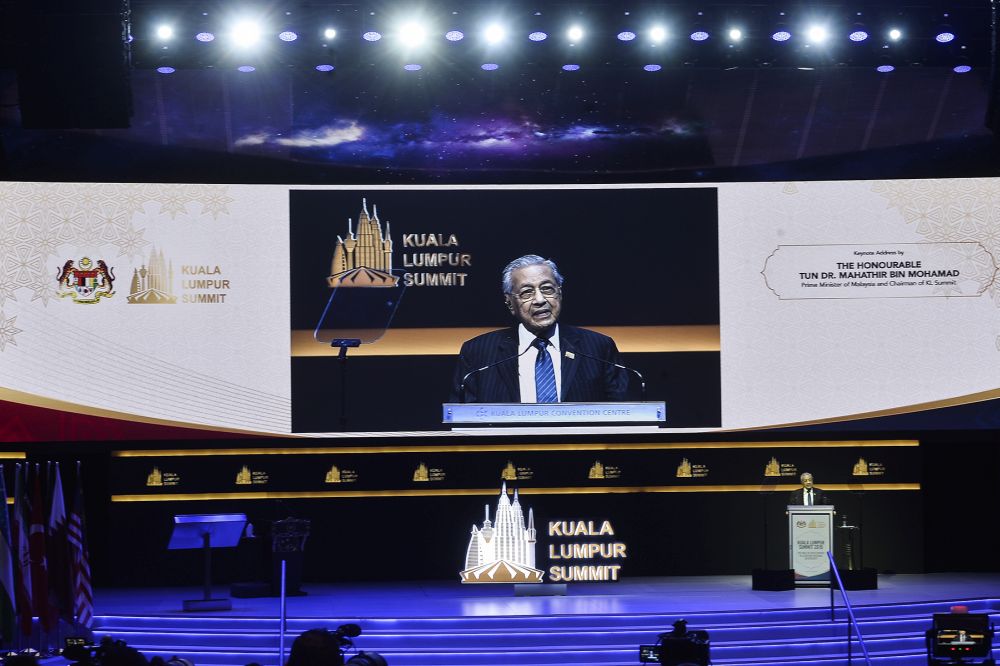 Prime Minister Tun Dr Mahathir Mohamad delivers his opening speech during the Kuala Lumpur Summit 2019 at the Kuala Lumpur Convention Centre December 19, 2019. u00e2u20acu201d Picture by Miera Zulyana