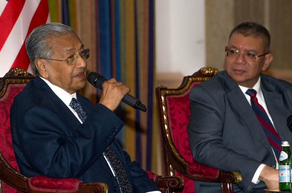 Prime Minister Tun Dr Mahathir Mohamad speaks during a dialogue session at a dinner with the Malaysian diaspora in Qatar December 13, 2019. u00e2u20acu201d Bernama pic