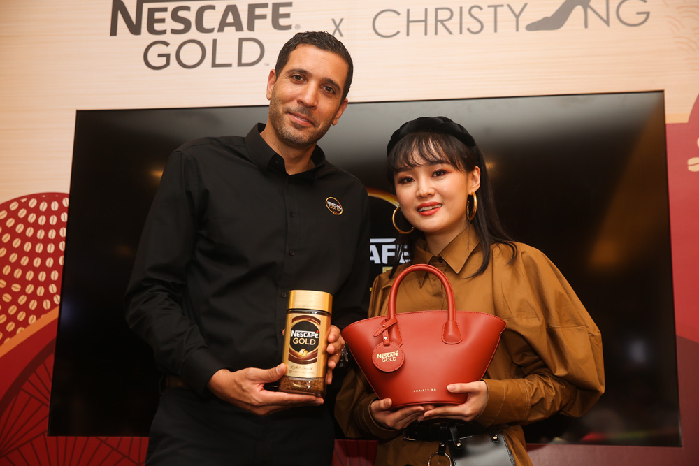 Nestle (Malaysia) Berhad business executive officer Othman Chraibi (left) and Christy Ng launching the partnership at Sunway Pyramid. u00e2u20acu201d Picture by Choo Choy May