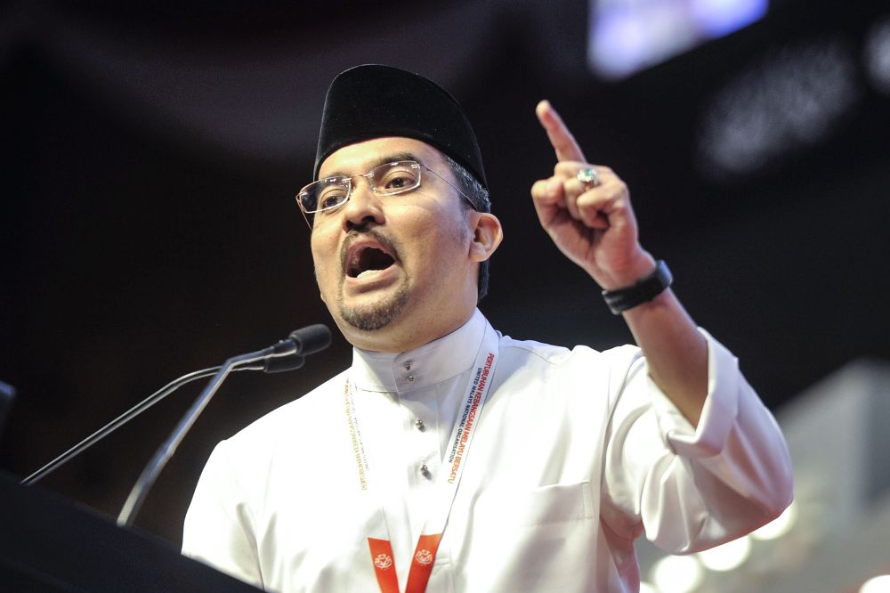 Umno Youth chief Datuk Asyraf Wajdi Dasuki speaks during the 2019 Umno General Assembly at the Putra World Trade Centre in Kuala Lumpur, December 5, 2019. u00e2u20acu201d Picture by Shafwan Zaidonnnn