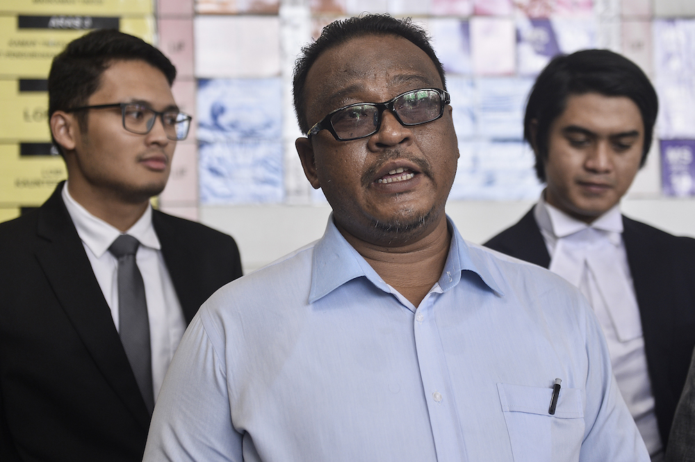 Mohd Khairul Azam Abdul Aziz speaks to reporters at the Kuala Lumpur High Court December 17, 2019. u00e2u20acu201d Picture by Miera Zulyana