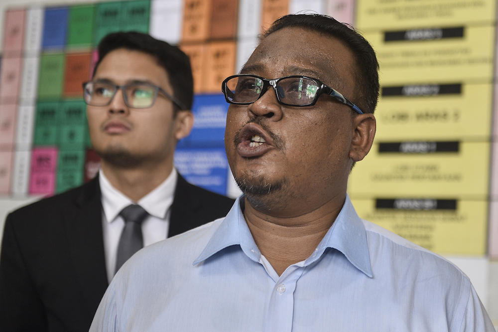 Mohd Khairul Azam Abdul Aziz speaks to reporters at the Kuala Lumpur High Court December 17, 2019. u00e2u20acu201d Picture by Miera Zulyana
