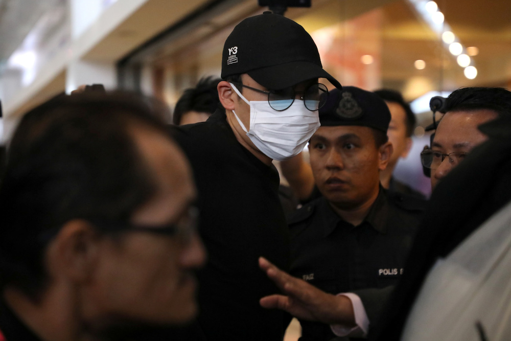 Japanese badminton player Kento Momota arrives at KLIA, as he leaves for Tokyo, after he was released from hospital following an injury in a vehicle collision on Monday, in Sepang, January 15, 2020. u00e2u20acu201d Reuters pic
