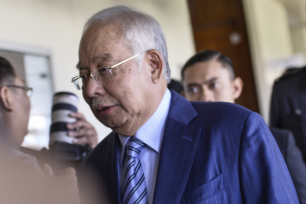 Former prime minister Datuk Seri Najib Razak arrives for his SRC trial at the Kuala Lumpur High Court January 6, 2020. u00e2u20acu201d Picture by Miera Zulyana