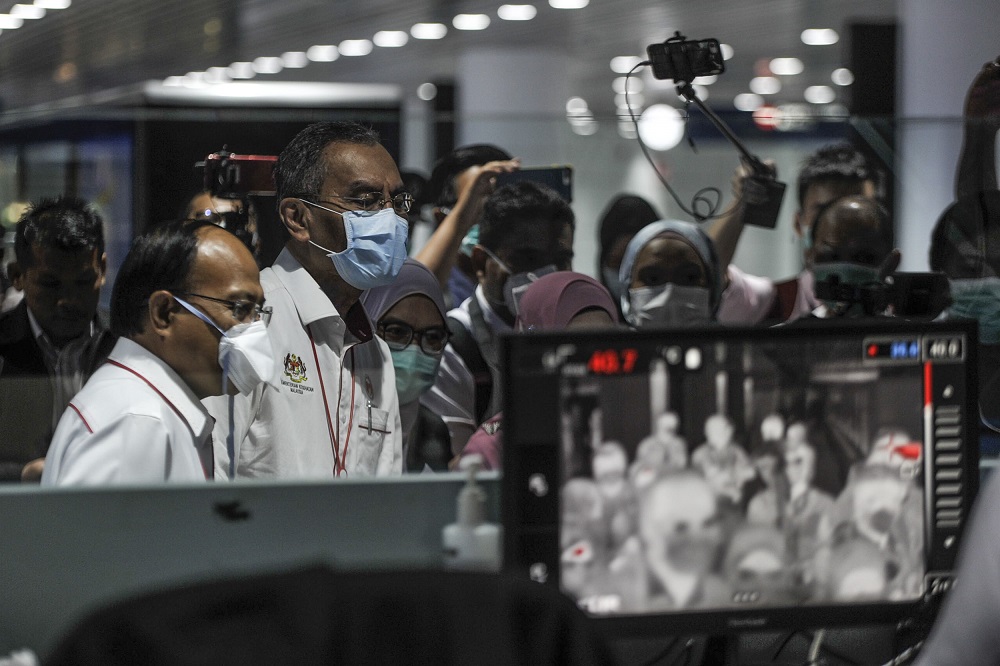 Health Minister Datuk Seri Dzulkefly Ahmad (centre) at one of the thermal screening point located at the Kuala Lumpur International Airport in Sepang January 27, 2020. u00e2u20acu201d Picture by Shafwan Zaidon