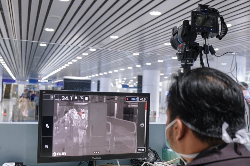 Travellers being screened by Health Ministry officials at the Kuala Lumpur International Airport January 24, 2020. u00e2u20acu201d Picture via Facebook/ Noor Hisham Abdullah