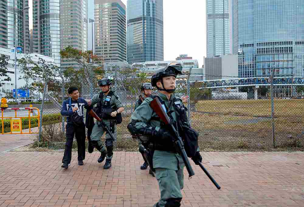 A man is let go after being interrogated by a police officer after a protest at Edinburgh Place in Hong Kong, January 12, 2020. u00e2u20acu201d Reuters pic