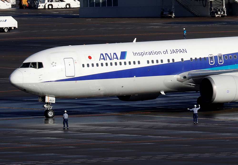 A Boeing 767-300ER plane chartered by the Japanese government, carrying evacuated Japanese nationals living in Wuhan arrives at Haneda airport, Tokyo, Japan January 29, 2020. u00e2u20acu201d Reuters pic