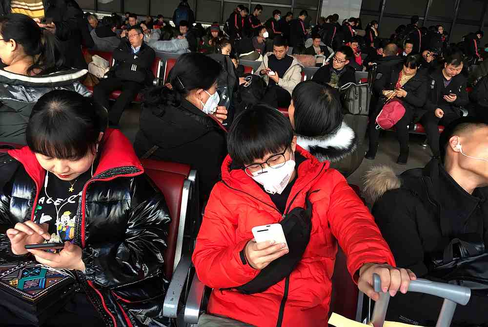 Passengers wearing masks are seen at the waiting area for a train to Wuhan at the Beijing West Railway Station, ahead of the Chinese Lunar New Year, in Beijing, China January 20, 2020. u00e2u20acu201d Reuters pic