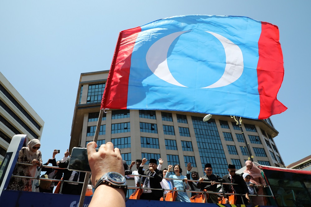 PKR MPs wave to supporters after meeting with the Yang di-Pertuan Agong outside the Istana Negara in Kuala Lumpur February 26, 2020. u00e2u20acu201d Reuters pic