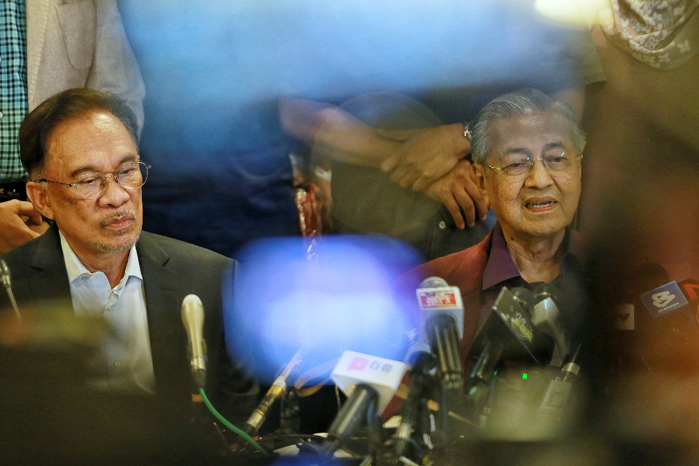 Datuk Seri Anwar Ibrahim and Tun Dr Mahathir Mohamad are seen during a press conference after the Pakatan Harapan President Council Meeting at Yayasan Perdana Foundation February 21, 2020. u00e2u20acu201d Picture by Ahmad Zamzahuri  