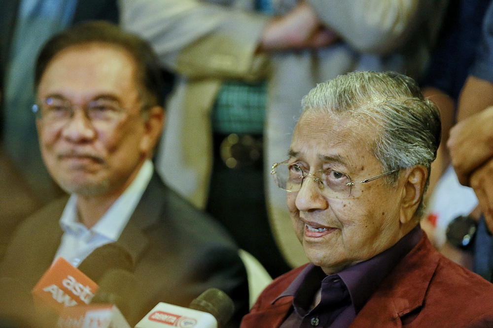 Datuk Seri Anwar Ibrahim and Tun Dr Mahathir Mohamad are seen during a press conference after the Pakatan Harapan President Council Meeting at Yayasan Perdana Foundation February 21, 2020. u00e2u20acu201d Picture by Ahmad Zamzahuri  