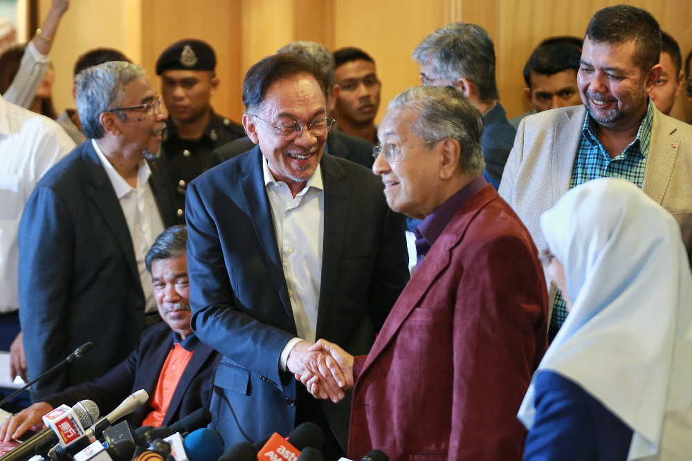 Datuk Seri Anwar Ibrahim and Tun Dr Mahathir Mohamad are seen during a press conference after the Pakatan Harapan President Council Meeting at Yayasan Perdana Foundation February 21, 2020. u00e2u20acu201d Picture by Ahmad Zamzahuri  