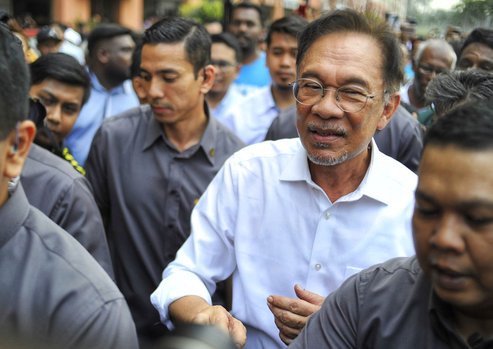 PKR president Datuk Seri Anwar Ibrahim leaves the PKR headquarters in Petaling Jaya February 26, 2020. u00e2u20acu201d Picture by Shafwan Zaidon