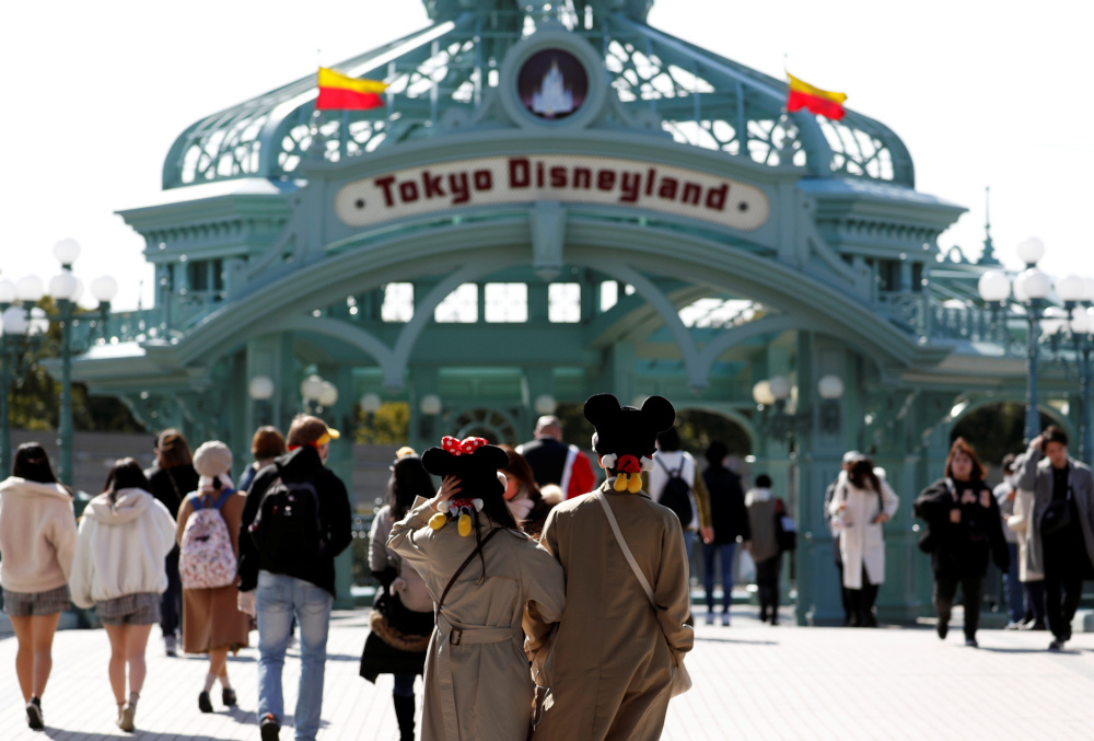 Visitors are seen outside Tokyo Disneyland in Urayasu, east of Tokyo, Japan February 28, 2020. u00e2u20acu201d Reuters pic 