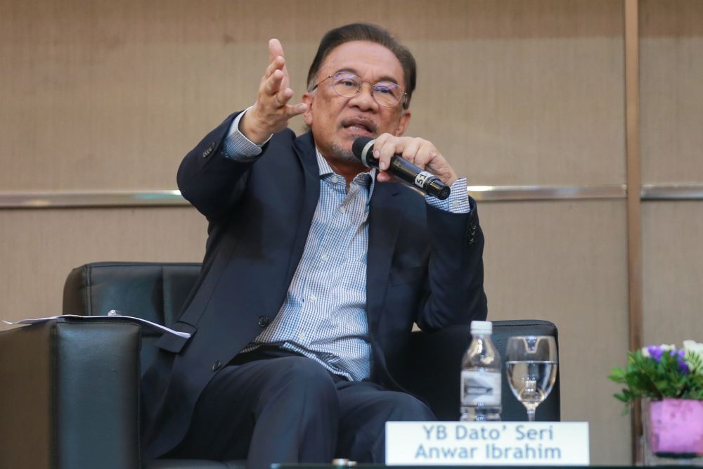 Datuk Seri Anwar Ibrahim speaks during a symposium in Bangsar South February 20, 2020. u00e2u20acu2022 Picture by Ahmad Zamzahuri