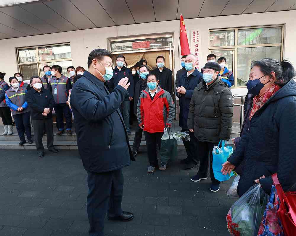 Chinese President Xi Jinping inspects the novel coronavirus prevention and control work at Anhuali Community in Beijing, China February 10, 2020. u00e2u20acu201d Xinhua pic via Reuters