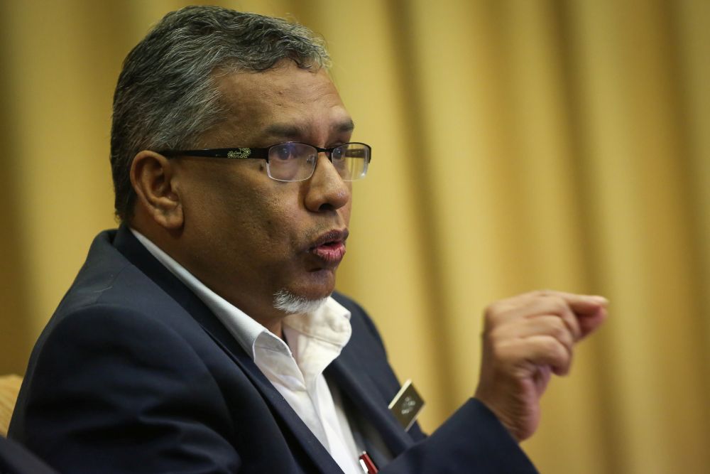 Deputy Minister in the Prime Minister's Department Mohamed Hanipah Maidin speaks during a media conference on fake news in Putrajaya February 21, 2020. u00e2u20acu201d Picture by Yusof Mat Isa