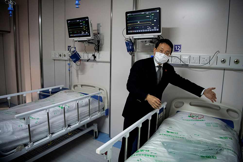 Doctor Lu Hangzhou, co-director of Shanghai Public Clinical Centre, shows a quarantine room for coronavirus patients in Shanghai, China February 17, 2020. u00e2u20acu201d Noel Celis/pool pic via Reuters