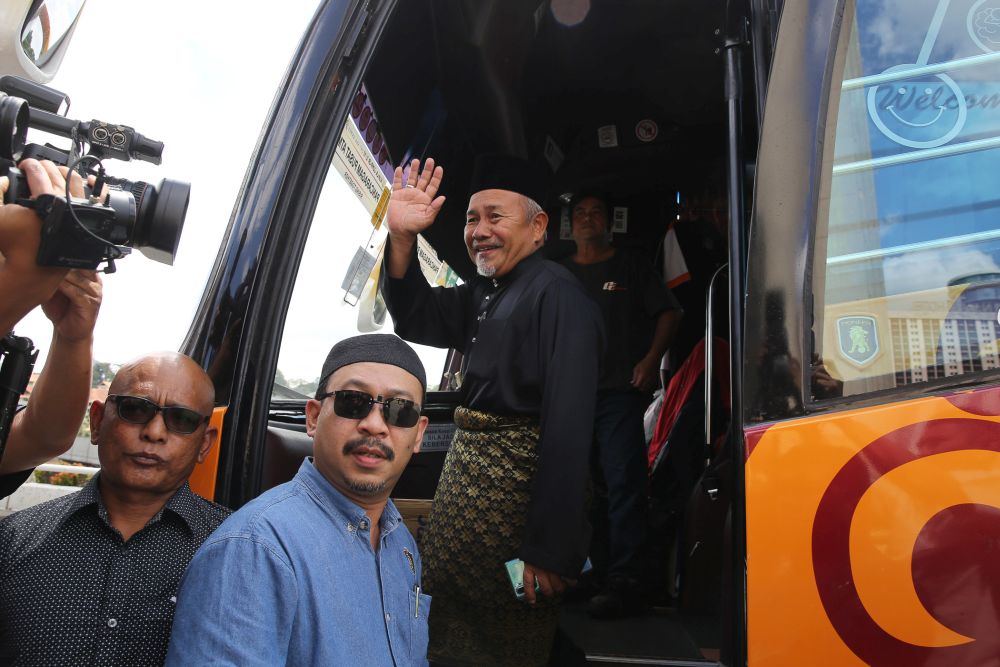 PAS Deputy President Datuk Tuan Ibrahim Tuan Man boards a bus bound for Istana Negara for an audience with the Yang di-Pertuan Agong February 25, 2020. u00e2u20acu2022 Picture Yusof Mat Isa