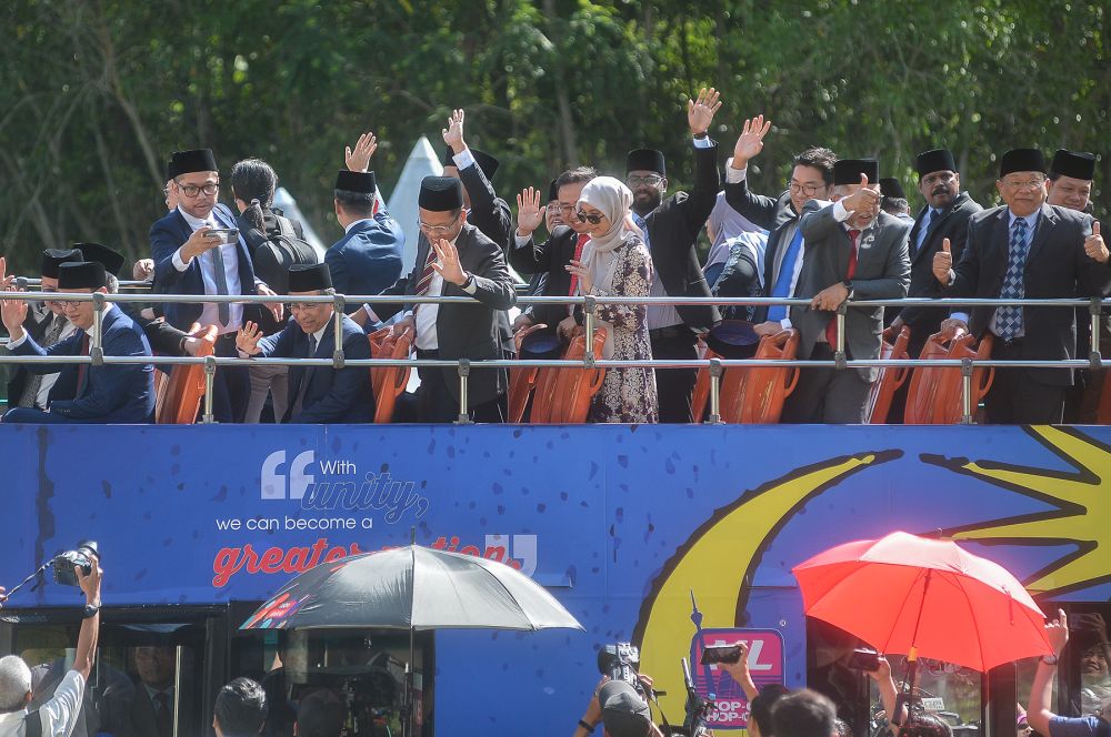 A bus ferrying PKR MPs arrives at Istana Negara February 26, 2020. u00e2u20acu2022 Picture Miera Zulyana