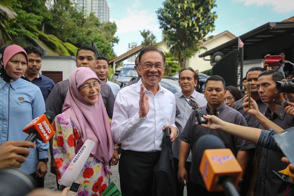 Datuk Seri Anwar Ibrahim speaks to reporters gathered outside his residence in Kuala Lumpur February 26, 2020. u00e2u20acu201d Picture by Yusof Mat Isa