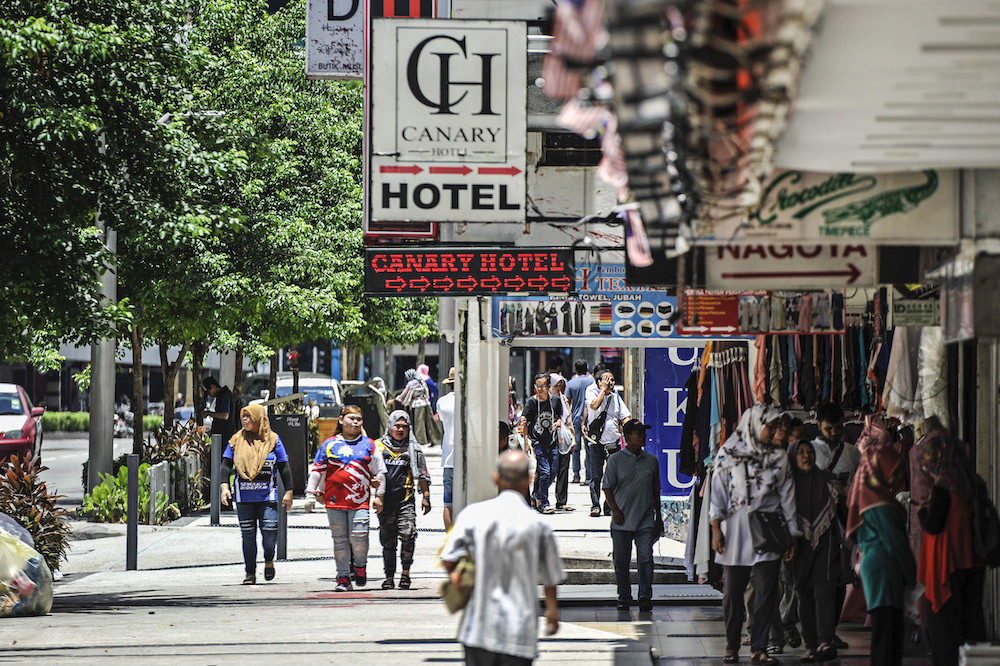 People walking along Jalan Tuanku Abdul Rahman in Kuala Lumpur March 15, 2020 u00e2u20acu201d Picture by Shafwan Zaidon