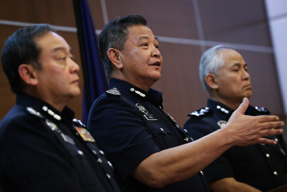 Inspector-General of Police (IGP) Tan Sri Abdul Hamid Bador (centre) speaks during a press conference in Kuala Lumpur March 17, 2020. u00e2u20acu201d Picture by Yusof Mat Isa
