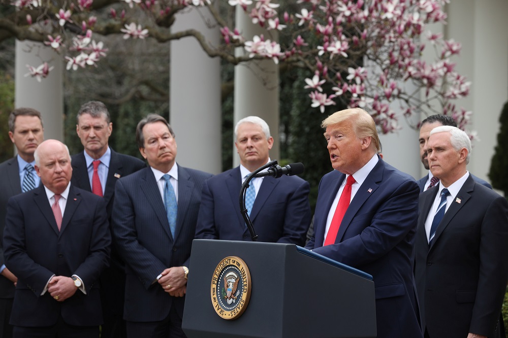 US President Donald Trump is accompanied by Vice President Mike Pence and industry executives during news conference in the Rose Garden of the White House in Washington March 13, 2020. u00e2u20acu201d Reuters pic