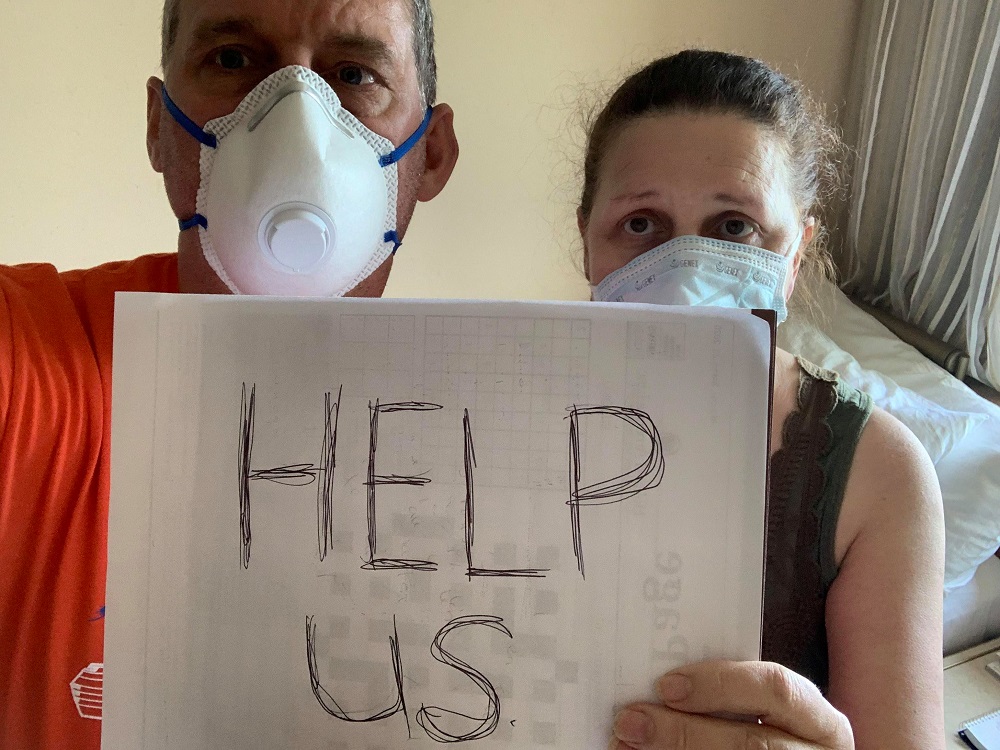 Canadian passengers Chris and Anna Joiner ask for help on board the MS Zaandam, Holland America Line cruise ship, during the coronavirus outbreak, off the shores of Panama City March 27, 2020. u00e2u20acu201d Chris Joiner/Handout via Reuters