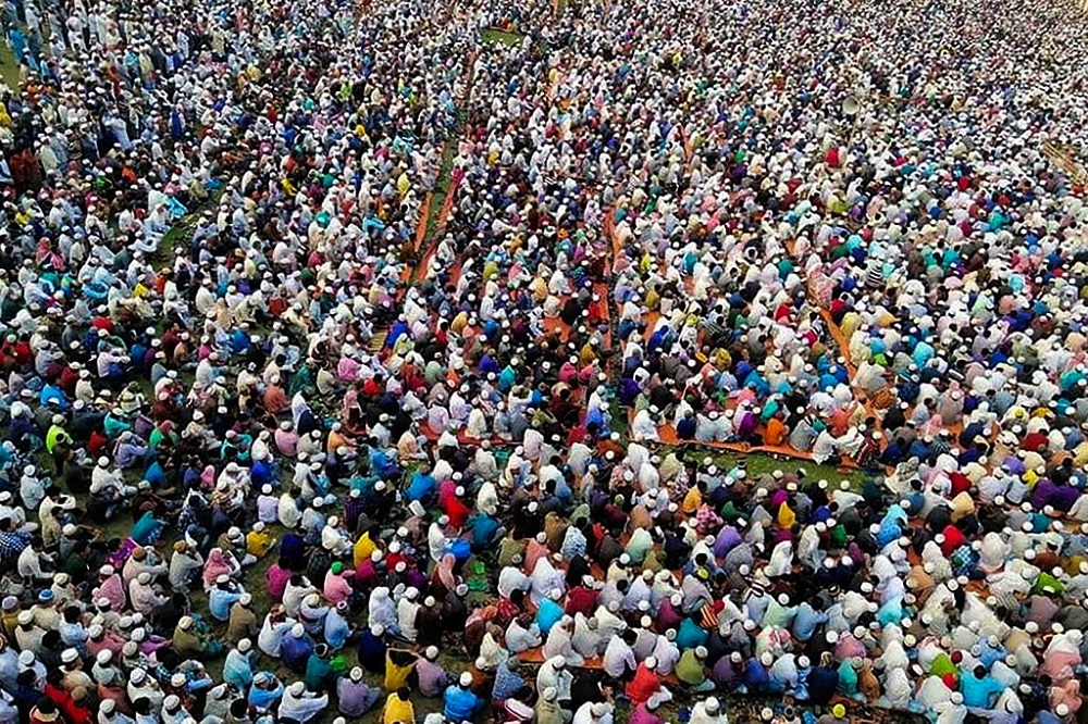 Thousands of Muslims attend a prayer session asking for safety amid concerns over the spread of the Covid-19 novel coronavirus, near Raipur in Lakshmipur district March 18, 2020. u00e2u20acu201d AFP pic