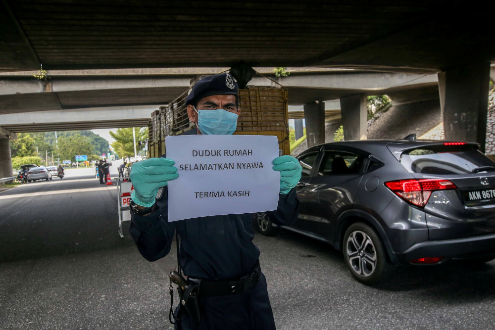 A police road block is seen at Jalan Kuala Kangsar following the movement control order to curb the spread of Covid-19 infection March 20, 2020. u00e2u20acu201d Picture by Farhan Najib