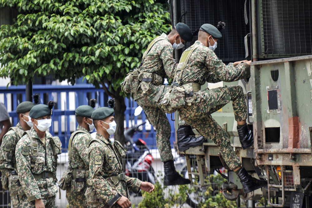Malaysian Armed Forces being deployed to help the police enforce the movement control order in Kuala Lumpur, March 22, 2020. u00e2u20acu201d Picture by Shafwan Zaidon