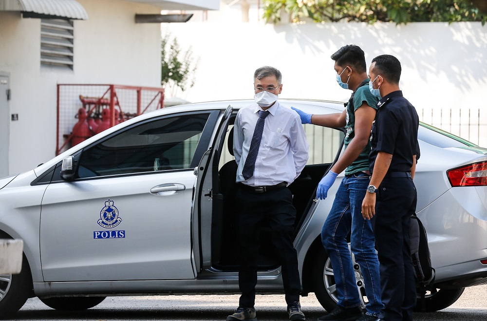 Consultant Cardiologist Dr Ong Hean Teik is pictured arriving at the George Town Court Complex March 30, 2020. u00e2u20acu201d Picture by Sayuti Zainudin