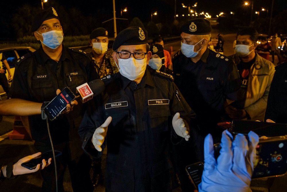 Datuk Seri Mazlan Lazim speaks to reporters at the police roadblock set up near the Serdang Hospital, March 28, 2020. u00e2u20acu201d Bernama pic