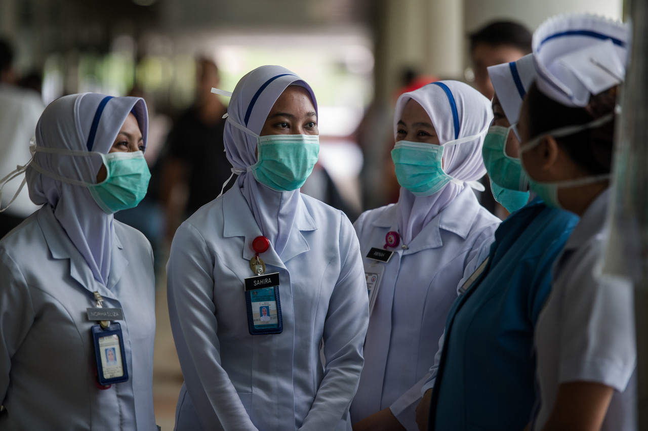 Medical personnel are seen at a hospital in Kuala Lumpur March 20, 2020. u00e2u20acu201d Bernama pic