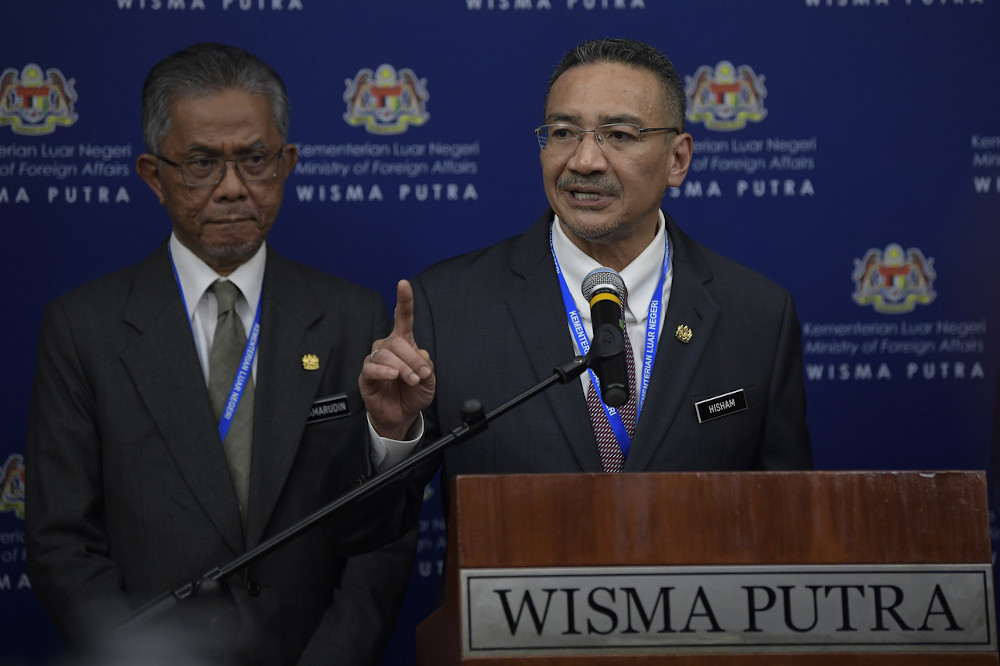 Foreign Minister Datuk Seri Hishammuddin Hussein and his deputy Datuk Kamaruddin Jaafar during a press conference at Wisma Putra March 11, 2020. u00e2u20acu201d Bernama pic 