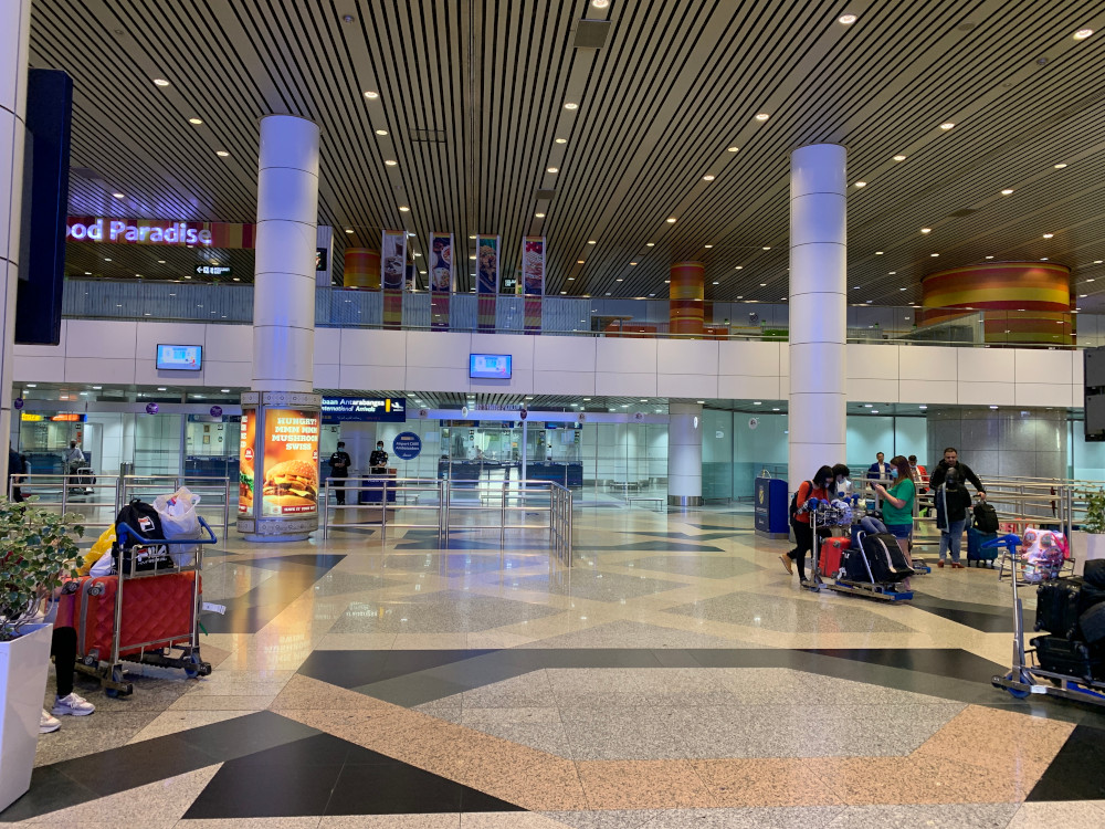 Ghost airport: Very few Malaysian passengers seen waiting around at the arrival area. u00e2u20acu201d Picture by Thasha Jayamanogaran 