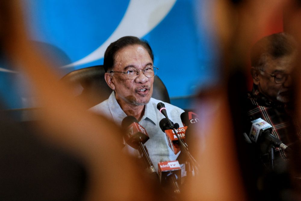 PKR president Datuk Seri Anwar Ibrahim speaks to reporters during a press conference at the partyu00e2u20acu2122s headquarters in Petaling Jaya March 13, 2020. u00e2u20acu201d Picture by Ahmad Zamzahuri
