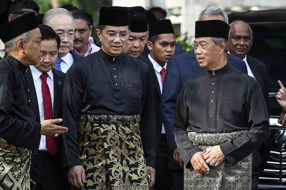 Datuk Seri Mohamed Azmin Ali (centre)  and other party leaders gather at the residence of Tan Sri Muhyiddin Yassin (right) leaving for the Istana Negara in Kuala Lumpur March 1, 2020. u00e2u20acu201d Picture by Yusof Mat Isa